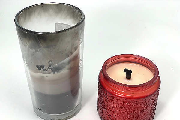 Why would anyone want the candle on the left, which is loaded with soot?